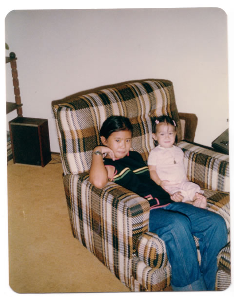 tang and annie hanging out on a recliner in california