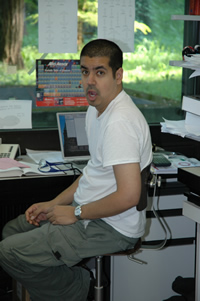 arif kaim at desk